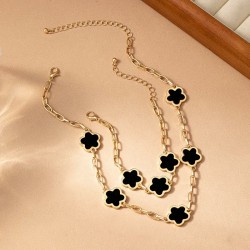 Conjunto de colgante y pulsera de trebol