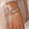 Pulsera dorada con charms corazon