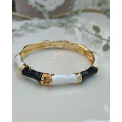 Brazalete negro con dorado