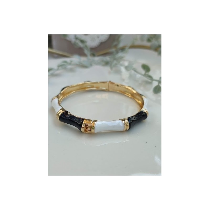 Brazalete negro con dorado