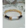 Brazalete negro con dorado