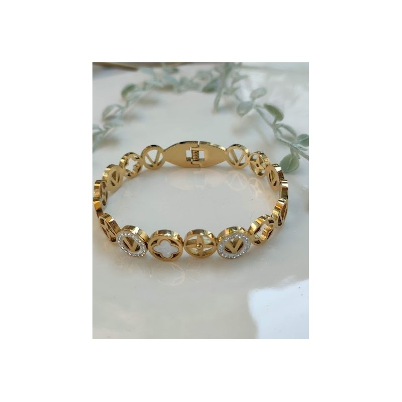 Brazalete dorado trebol y circonia