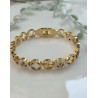 Brazalete dorado trebol y circonia