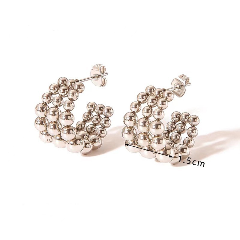 Aretes modernos chapados en oro blanco