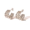 Aretes modernos chapados en oro blanco